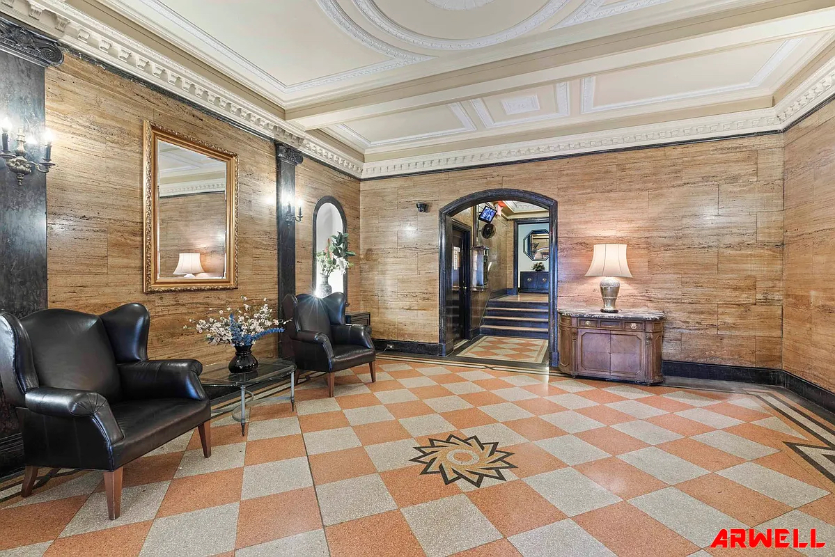 Reception area with chairs and decorative lamp
